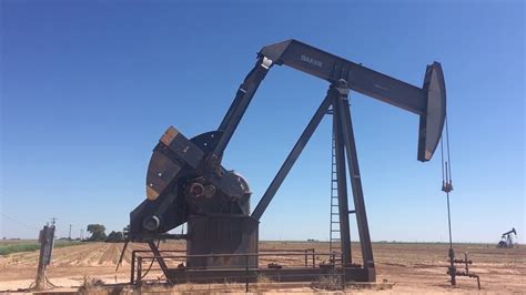 Pumpjack on an oil well in Texas - YouTube