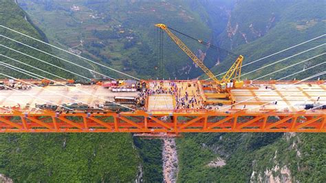 China drives ever upwards with world's highest bridge