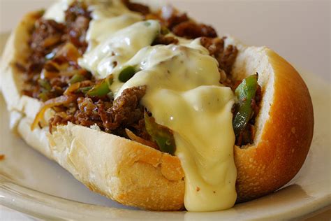 Slow Cooker Philly Cheese Steak Sandwiches - The Cooking Mom