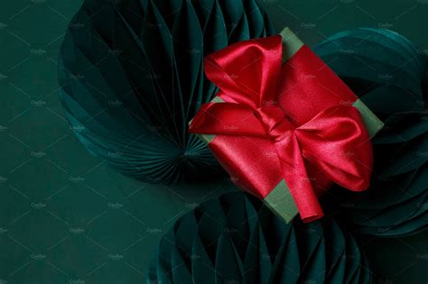 Christmas gift box with red ribbon | Holiday Stock Photos ~ Creative Market