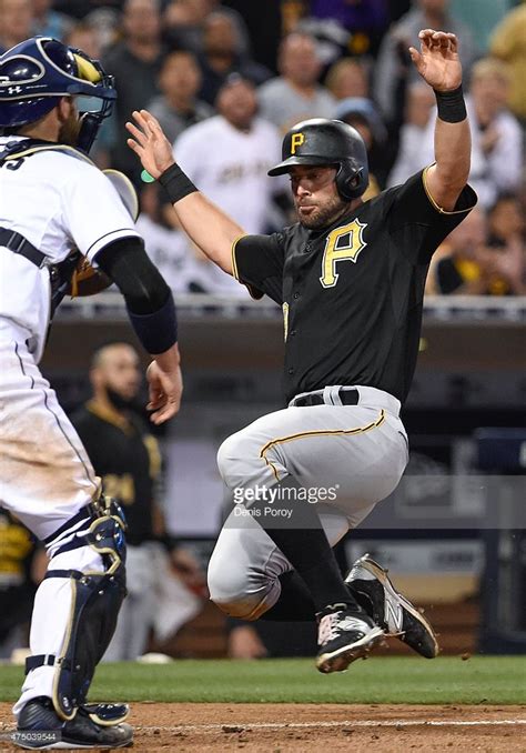 Francisco Cervelli #29 of the Pittsburgh Pirates scores ahead of the ...