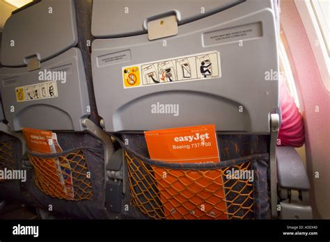 UK BRISTOL EASYJET BOEING 737-700 INTERIOR BACK VIEW OF CHAIR WITH ...