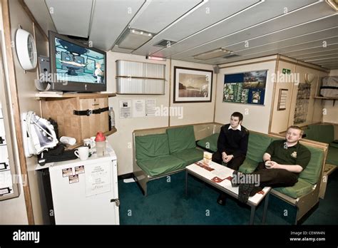 Recreation room on naval aircraft carrier HMS Illustrius Stock Photo - Alamy