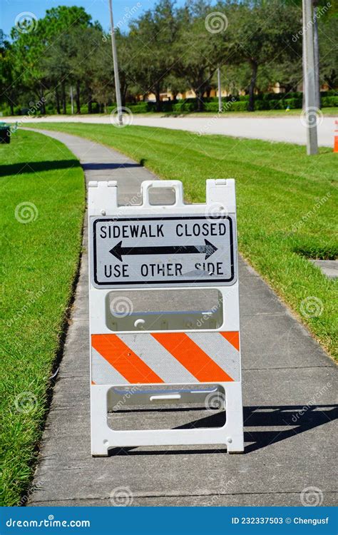 Sign Shows that the Sidewalk is Closed Stock Image - Image of community ...