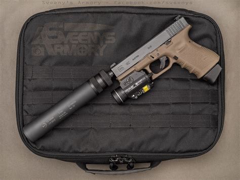 Glock 19 with suppressor and laser/light [1600x1200][OC] : r/Glocks