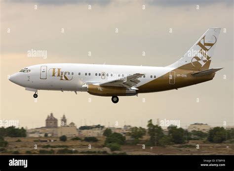 A Boeing 737-200 landing in the evening Stock Photo - Alamy