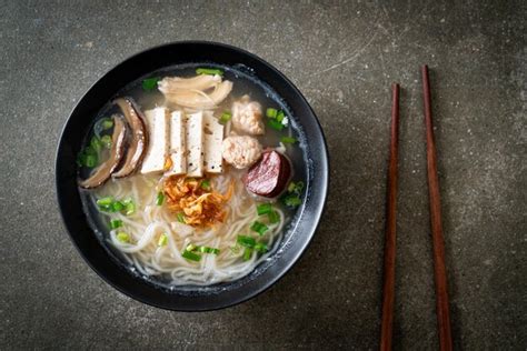 Premium Photo | Vietnamese rice noodles soup with vietnamese sausage ...