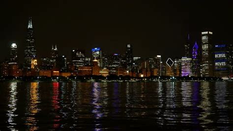 Chicago Skyline Reflected on the Lake at Night Panoramic, Stock Footage