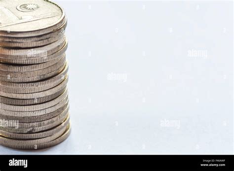 coin stack on white background Stock Photo - Alamy