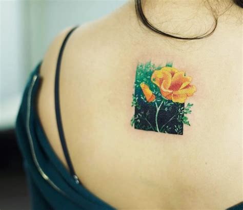 Yellow flower tattoo by Zihe Tattoo | Photo 26971