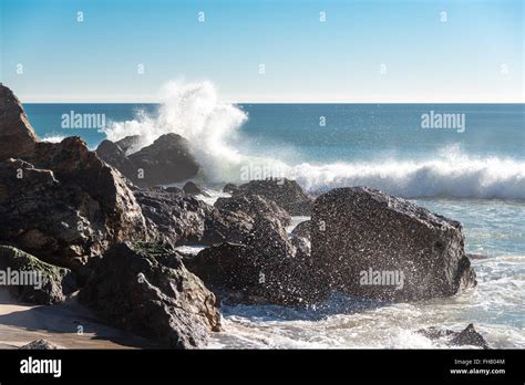 waves crashing into point dume, zuma beach, LA Stock Photo - Alamy