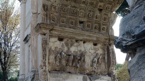 Relief from the Arch of Titus, showing The Spoils of Jerusalem being brought into Rome - YouTube