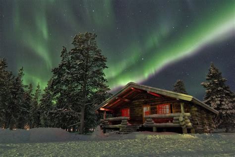 This striking cottage under the Northern lights in Lapland, Finland. | See the northern lights ...