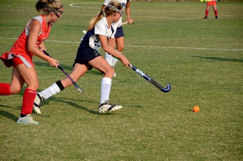 Girls Hockey Action Astro editorial image. Image of skill - 26643620