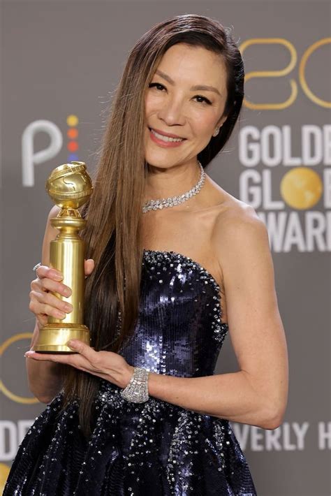 Michelle Yeoh Dazzles In Armani Privé Gown At 2023 Golden Globes Awards