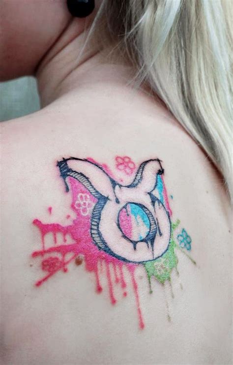 Taurus tattoo -- I love the color splatter background... could do without the flowers. | Taurus ...