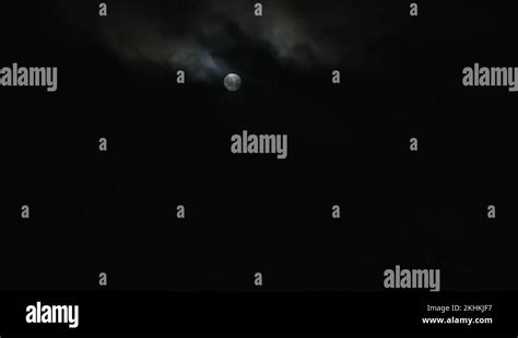 dark night with black clouds and full moon, creepy clouds moving Stock ...