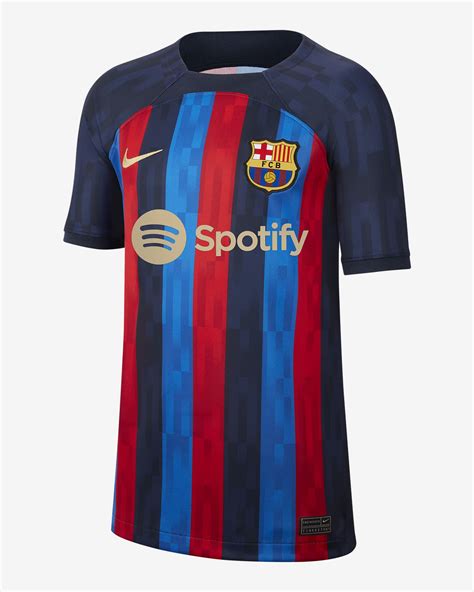 F.C. Barcelona 2022/23 Stadium Home Older Kids' Nike Dri-FIT Football Shirt. Nike NL