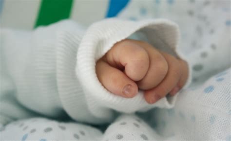 Baby Hand In His Crib Free Stock Photo - Public Domain Pictures