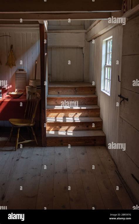 Interior of a very old fishing shack, light streaming through window ...