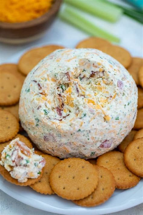 Cheddar Ranch Cheese Ball is the perfect Holiday appetizer that is made of shredded cheddar ...