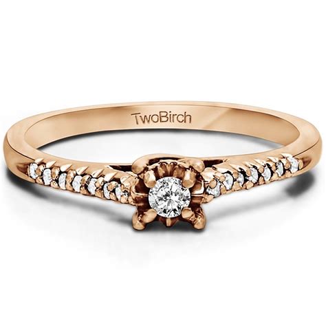 a yellow gold engagement ring with diamonds