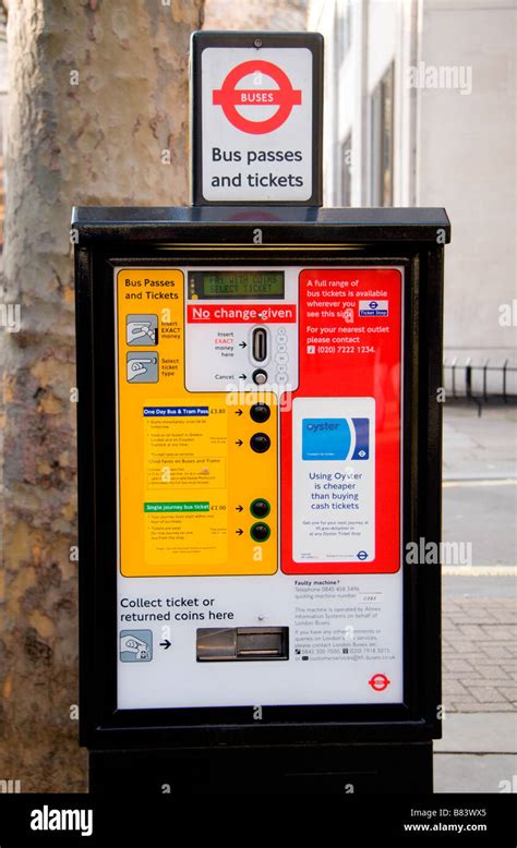 A London Bus ticket machine, a common sight beside bus stops in central London Stock Photo - Alamy