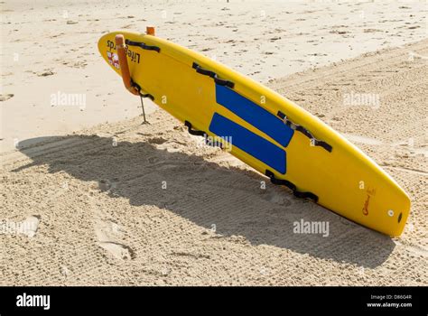 RNLI Lifeguard rescue board on sandy beach at Boscombe, Bournemouth ...