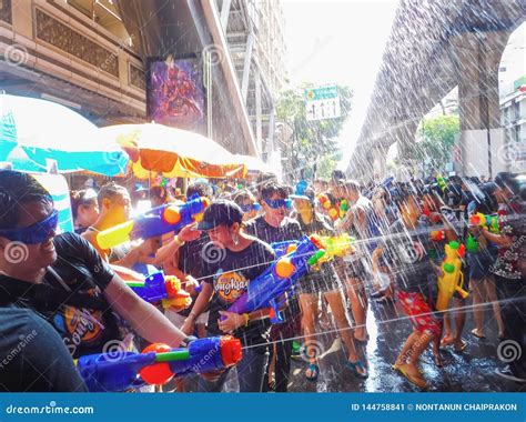 BANGKOK, THAILAND - APRIL 13: Songkran Festival in Bangkok on April 13, 2019 Water Splashing Fun ...