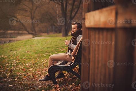 man sitting alone on a bench 5751199 Stock Photo at Vecteezy