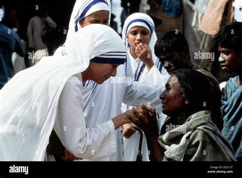 Mother Teresa Helping The Poor