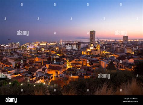 Alicante skyline at dusk viewed from Santa Barbara castle Spain Stock ...