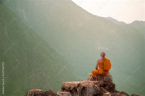 Buddha monk practice meditation on mountain Stock Photo | Adobe Stock