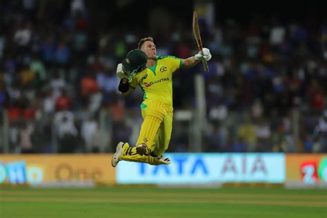 David Warner leaps in celebration after bringing up his century ...