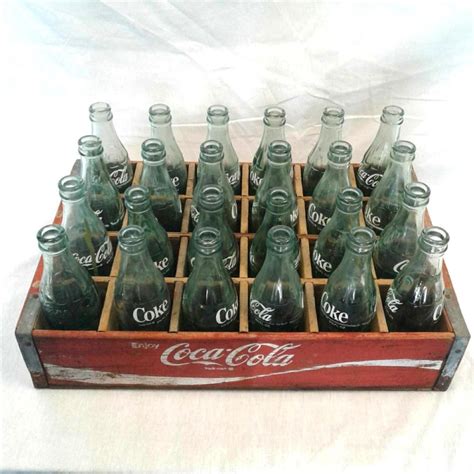 Sold Price: 24 Coke Bottles with Wooden Case - June 4, 0118 5:00 PM EDT