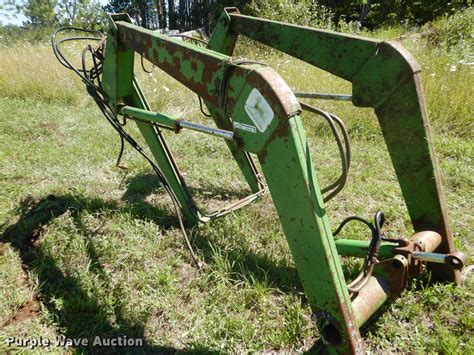 John Deere 48 loader in Hancock, MI | Item GV9168 sold | Purple Wave