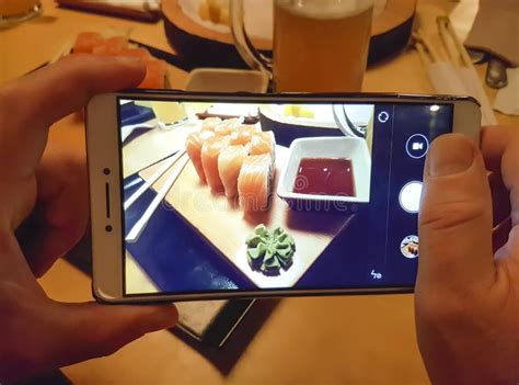 Hands Take Pictures of Sushi Stock Photo - Image of digital, camera: 102294540