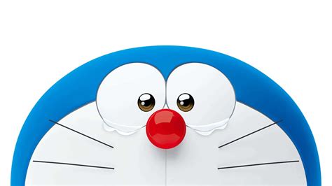 Download Doraemon stands proud with his iconic blue body and hat | Wallpapers.com