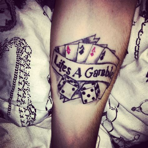 life's a gamble hand tattoo - budgetvanlineslv