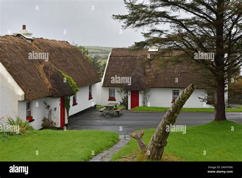 Thatched cottages at Tullycross, Renvyle, Connemara, County Galway, Republic of Ireland, North ...