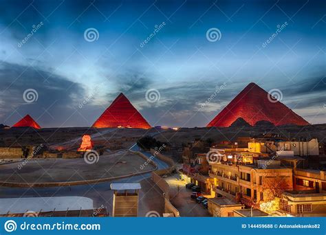 The Pyramids at Night, View from Giza Buildings, Egypt Stock Photo - Image of illuminated, light ...