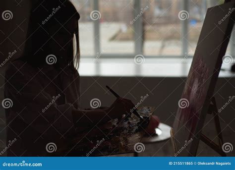 Girl Painting in Front of the Window. Stock Image - Image of paintbrush ...