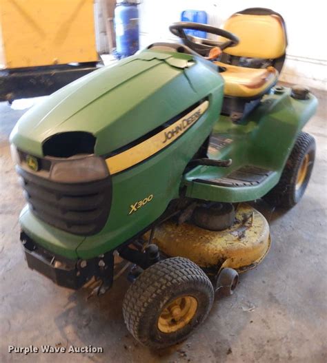 John Deere X300 lawn mower in Eucha, OK | Item DE5703 sold | Purple Wave