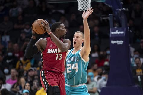 Lowry, Heat battle back to beat Hornets 111-107 in 2OT | AP News