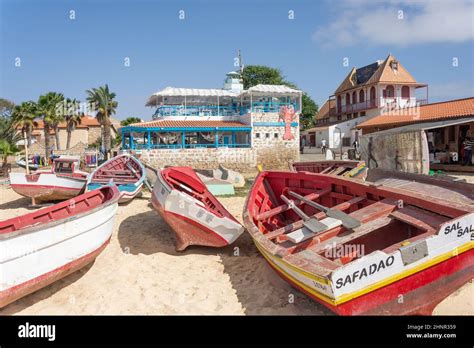 Colourful fishing boats and LobStar Enjoyable Seafood Restaurant ...