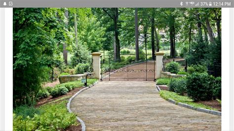 Entrance Gates and Driveway Landscaping Inspiration