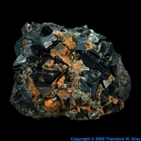 Cassiterite, a sample of the element Tin in the Periodic Table