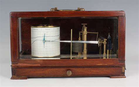 An early to mid-20th century mahogany cased barograph with lacquered ...