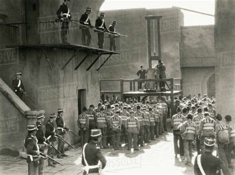 Prisoners prepare for execution by guillotine - (ov141) - Stock Photo - Dissolve