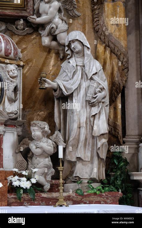 Saint Clare of Assisi, statue on the High Altar in the Catholic Church of the Saint Clare in ...